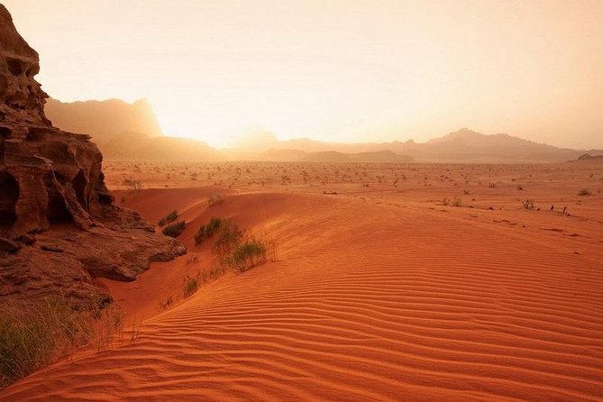 Explore Jordan Tour 6 day tour 5 nights - Day 4: Petra’s guided route through the Siq and Treasury, then Wadi Rum at sunset