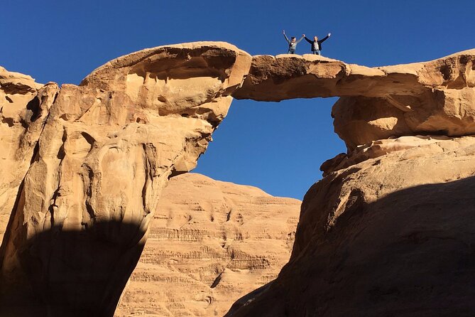Full-Day Jeep Tour in Wadi Rum with Overnight Stay - Burdah Bridge and Abu Khashaba Canyon for big views and a little scramble