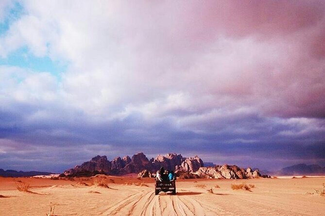 Full Day Jeep Tour with Overnight in Bedouin Camp - Desert Guide Camp overnight: shower, dinner, and your private tent