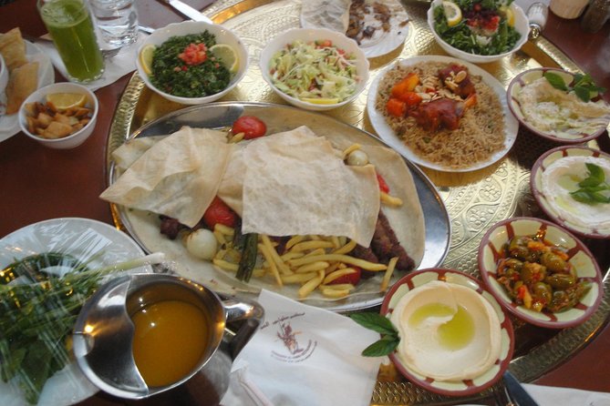 Guided Amman Tour with lunch (4 hrs) - Hotel pickup, private vehicle comfort, and onboard perks