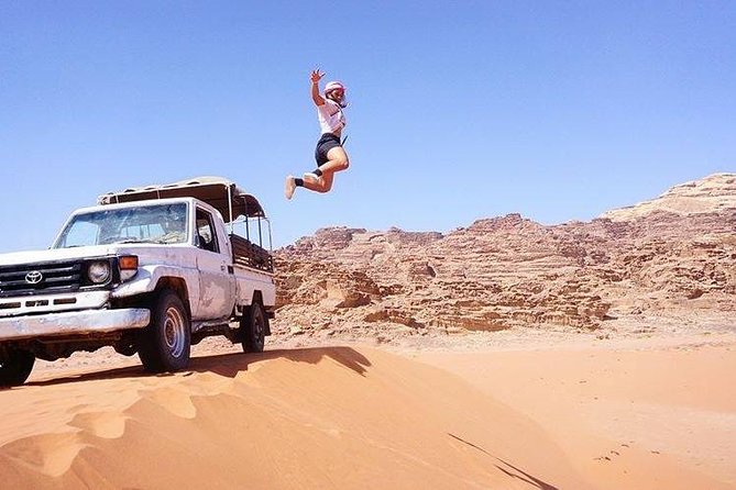 Jeep Tour in Wadi Rum with Professional Guide (Full day) - Inside the jeep: rear-trunk seats, inside seats, and photo-friendly angles