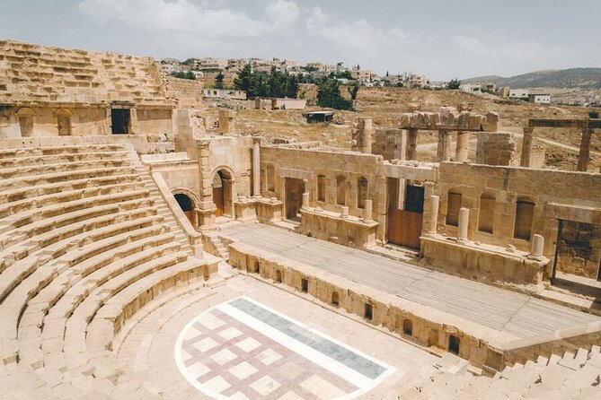 Jerash Half-Day Tour From Amman - Self-guided versus hiring a local guide at the site