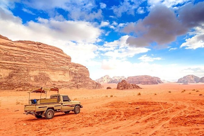 One Day Tour to Wadi Rum From Amman - The core Wadi Rum sights: Hanging Arch, Khazaali spring, and the Seven Pillars