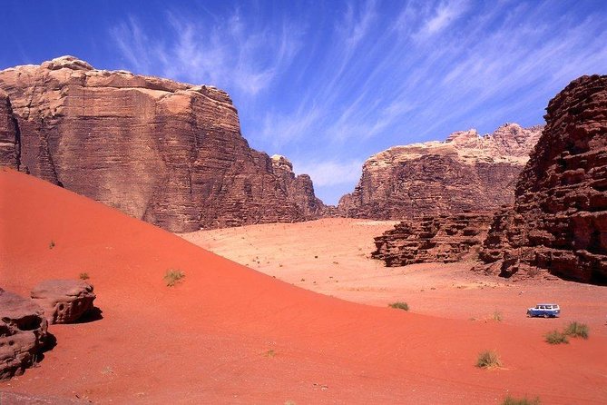 One Day Tour to Wadi Rum From Amman - The final Wadi Rum stop: optional camel rides, dune climbing, and rock bridges