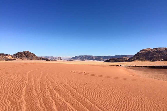 Petra and Wadi Rum 2 Days Tour from Aqaba - Day 1 from Aqaba: market break, Wadi Rum check-in, sunset jeep
