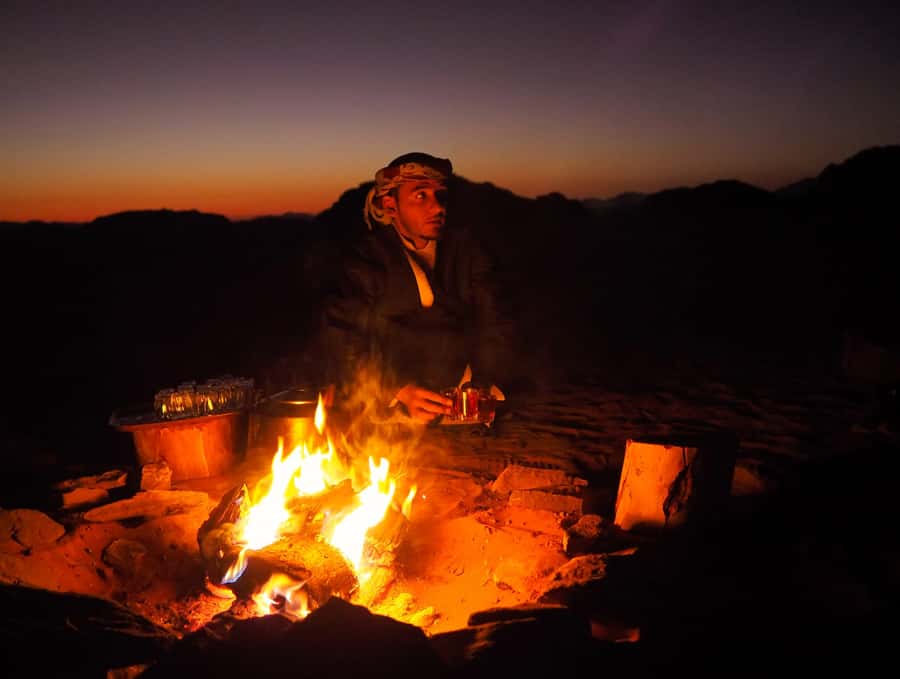 Wadi Rum: 2 Hour Camel Ride at Sunset/Sunrise Overnight - Fire camp evening: dinner cooked on the sand, bonfire time, stars included