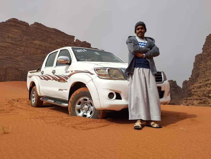 Wadi Rum: 2-Hour Jeep Tour with Bedouin Tea - Al Ramal red sand dune: photos, a guided feel, and sandboarding