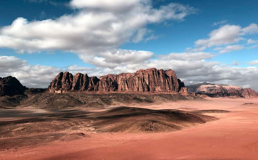 Wadi Rum:Full Day Tour Lunch Sand boarding Camel Ride Sunset - Khazali Mountain, the small arch, and photo angles